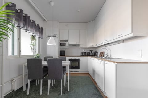 The apartment is equipped with all the modern amenities you need, including a fully stocked kitchen with a dishwasher and coffee maker