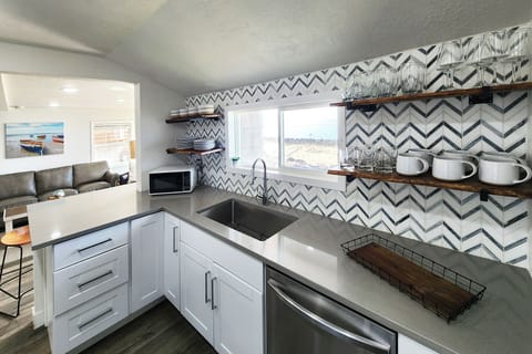 Gaze out the window while cleaning up.