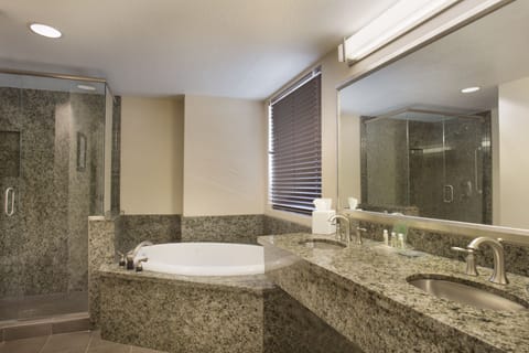 Suite, 1 King Bed (Additional Living Dining Area) | Bathroom | Combined shower/tub, free toiletries, hair dryer, towels