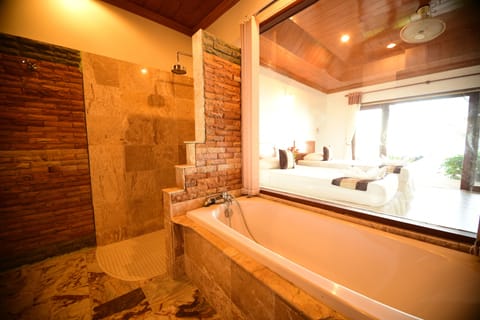 Superior Double Bed Sea View with Fan | Bathroom | Separate tub and shower, rainfall showerhead, free toiletries, bidet