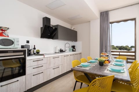 Family Apartment, Balcony, City View | Private kitchen | Espresso maker, electric kettle, toaster