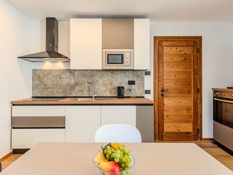 Furniture, Interior Design, Flooring, Wood, Floor, Room, Ceiling, Cabinetry, Lighting, Home