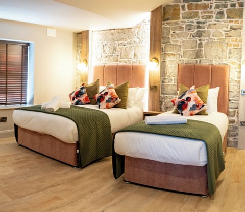 Superior Triple Room | Memory foam beds, iron/ironing board, travel crib, free WiFi