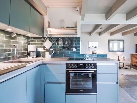 Kitchen Appliance, Kitchen, Countertop, Kitchen Stove, Major Appliance, Cabinetry, Gas Stove, Home Appliance, Stove, Interior Design