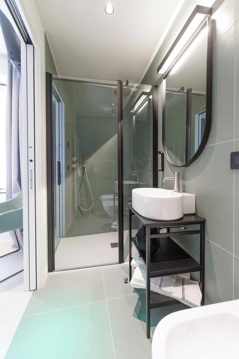 Economy Double Room | Bathroom | Shower, hair dryer, towels, soap