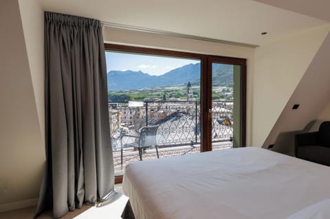 Deluxe Double Room, Balcony, City View | In-room safe, soundproofing, iron/ironing board, free WiFi