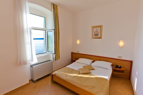 Standard Double Room, Sea View | In-room safe, cribs/infant beds, free WiFi, bed sheets