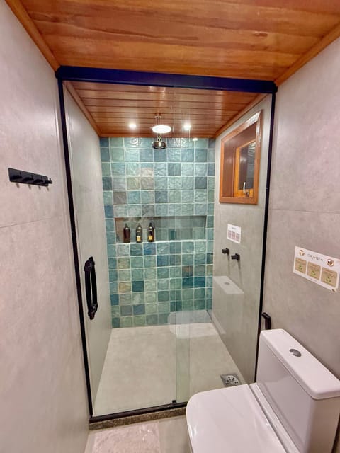 Comfort Loft, Beach View | Bathroom | Shower, hair dryer, towels, soap