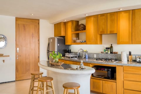 Signature Apartment, Ocean View | Private kitchen | Fridge, microwave, stovetop, cookware/dishes/utensils