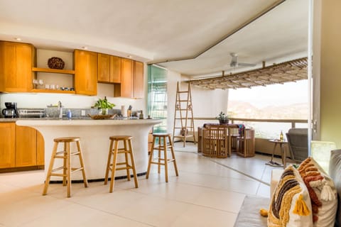 Signature Apartment, Ocean View | Private kitchen | Fridge, microwave, stovetop, cookware/dishes/utensils