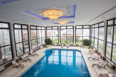 Indoor pool, open 10:00 AM to 10:00 PM, sun loungers