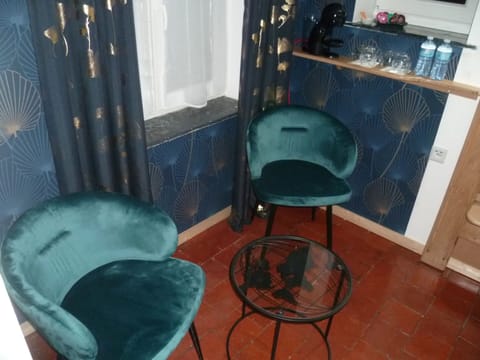 Standard Room | Living area | 72-inch Smart TV with cable channels