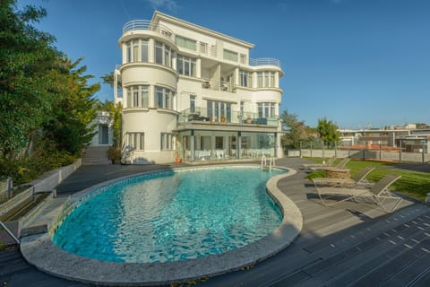 Seasonal outdoor pool, pool umbrellas