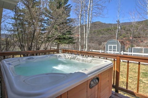 Hot tub on back deck with mountain views