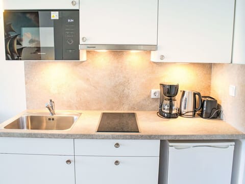 Countertop, Kitchen, Plumbing Fixture, Kitchen Appliance, Kitchen Sink, Tap, Sink, Cabinetry, Interior Design, Major Appliance