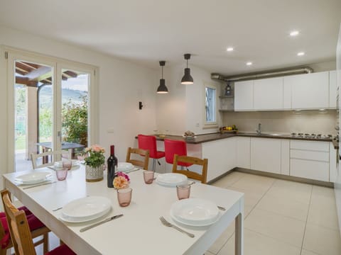 Furniture, Interior Design, Flooring, Countertop, Wood, Kitchen, Floor, Ceiling, Room, Kitchen & Dining Room Table