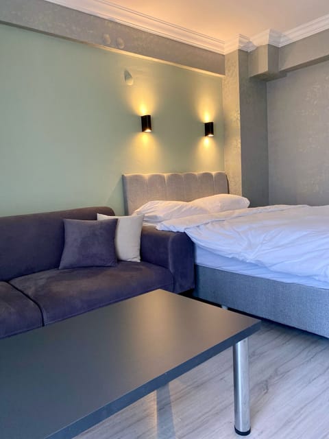 Classic Condo, Balcony | Premium bedding, desk, free WiFi, bed sheets