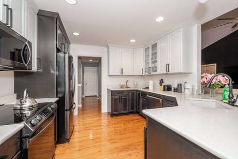 The elegant kitchen offers ample space & every home comfort