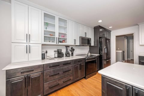 The elegant kitchen offers ample space & every home comfort