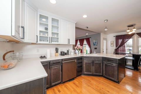 The elegant kitchen offers ample space & every home comfort