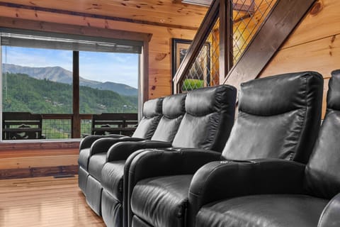 Theater room with comfy reclining seats!