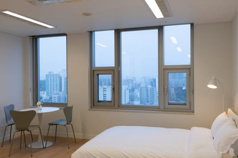 Superior Twin Queen(Cheonggyecheon view) | Individually decorated, desk, laptop workspace, blackout drapes