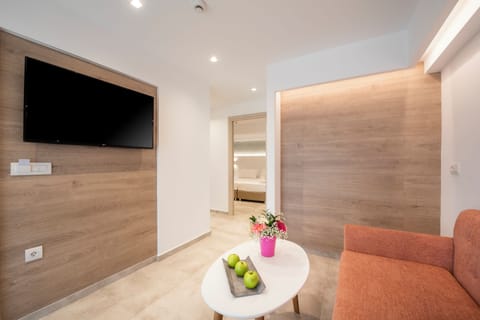 Deluxe Suite | Living area | Flat-screen TV