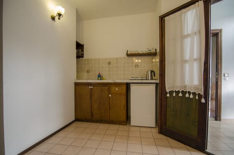 Apartment | Private kitchen | Fridge, stovetop, coffee/tea maker, electric kettle