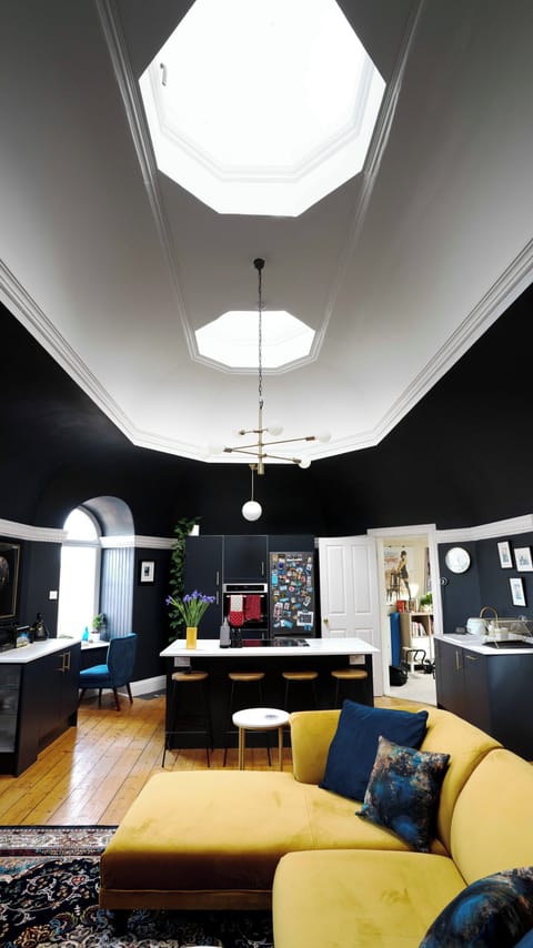 High vaulted ceiling with 2 cupola skylights