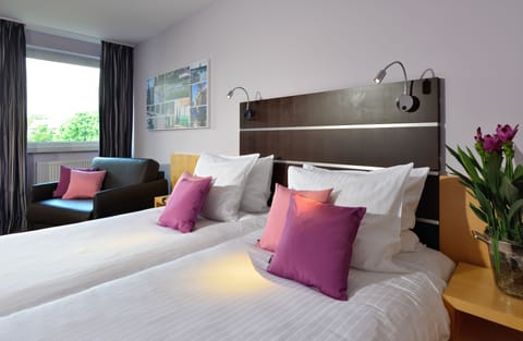 Comfort Double Room | Premium bedding, in-room safe, desk, soundproofing