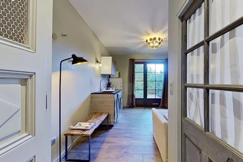 Apartment, Patio, Garden View | Soundproofing, iron/ironing board, free WiFi