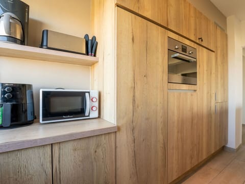 Interior Design, Wood, Flooring, Kitchen, Countertop, Cabinetry, Furniture, Kitchen Appliance, Floor, Ceiling