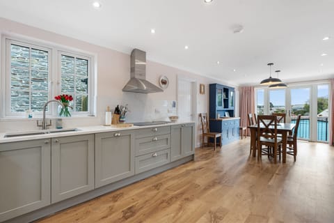 Kitchen sink and view of dining area in Trenaton, Holiday Home , Padstow Town, Cornwall
