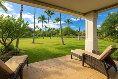 Comfortable chaise lounges on the ground floor lanai off the living room make relaxing easier than ever