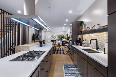 Sleek & Ready – Professional design meets everyday ease with a full gas range and endless counter space.