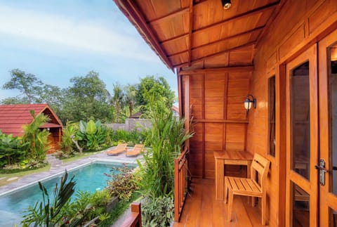 Deluxe Double Room, Pool View | Terrace/patio