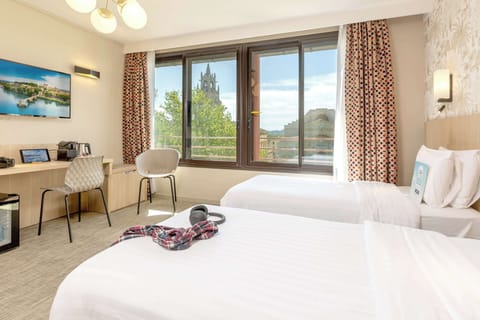 Minibar, desk, blackout drapes, soundproofing