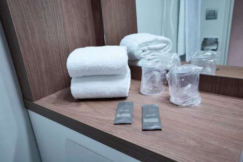 Combined shower/tub, eco-friendly toiletries, hair dryer, towels