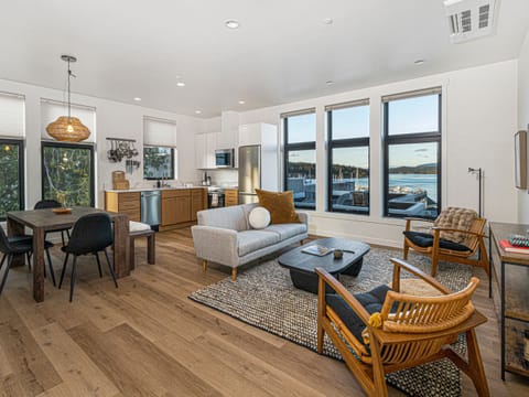 Enjoy the expansive water view from this luxurious penthouse located in the heart of downtown Friday Harbor.