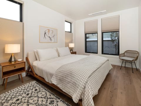 Bedroom #2: King bedroom with en suite bathroom and a courtyard view.