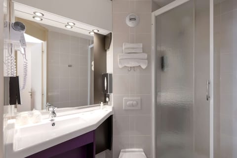 Shower, eco-friendly toiletries, hair dryer, towels