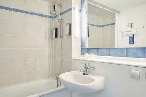 Combined shower/tub, eco-friendly toiletries, hair dryer, towels