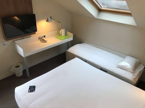 Premium bedding, desk, blackout drapes, iron/ironing board