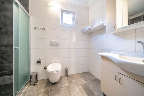 Double or Twin Room with Balcony | Bathroom | Shower, hair dryer, slippers, towels