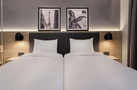 Premium bedding, desk, blackout drapes, iron/ironing board