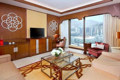 Presidential Suite, 1 Bedroom | Living area | 42-inch TV with satellite channels