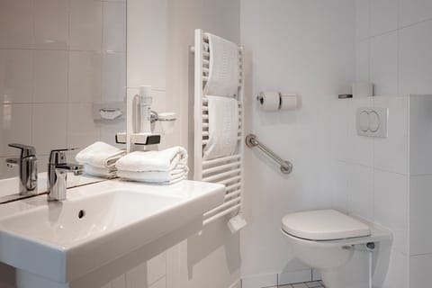 Shower, eco-friendly toiletries, hair dryer, towels