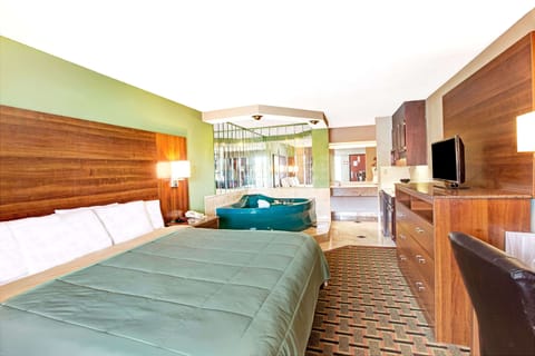 Room, 1 King Bed, Non Smoking, Refrigerator & Microwave (with Jacuzzi) | In-room safe, desk, iron/ironing board, rollaway beds