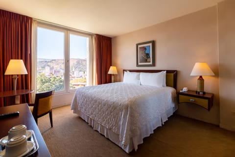 Standard Room, 1 King Bed | Premium bedding, down comforters, in-room safe, individually decorated