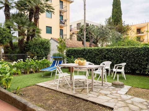 Furniture, Shrub, Outdoor Furniture, Garden, Chair, Shade, Lawn, Yard, Backyard, Landscaping